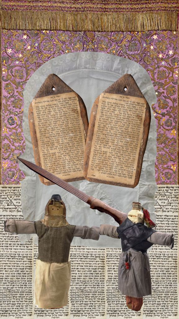 The background is an ornately, gold-embroidered, pink velvet Torah ark curtain. A pair of Purim dolls from Yemen hold a rusty-looking, metal, amuletic sword from Morocco, which points at an arch-shaped, lacy white cover for a circumcision pillow. On the cover are a pair of rectangular wooden boards which have yellowing paper plastered to them. The paper, also rectangular, has black Hebrew letters on it.